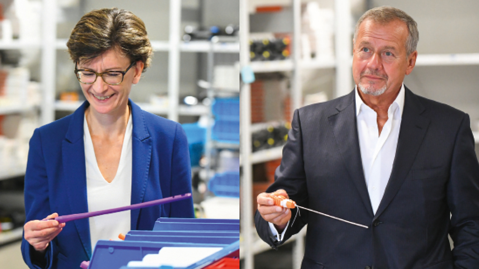 A man and a woman work in the lab